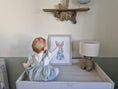 Load image into Gallery viewer, blue rabbit beth sitting hand up.jpeg__PID:f16507f2-8ecf-4dea-b0ec-34ede00321f3